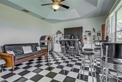 Welcome Home! Located in the peaceful deed restricted community on Rotonda Golf and Country Club - Long Marsh  in Florida - for sale on GolfHomes.com, golf home, golf lot