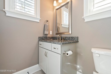 Elegant upgrades and thoughtful design define this like-new on Sea Trail Golf Resort in North Carolina - for sale on GolfHomes.com, golf home, golf lot