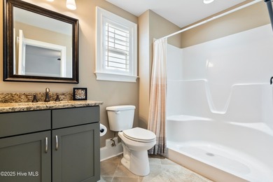 Elegant upgrades and thoughtful design define this like-new on Sea Trail Golf Resort in North Carolina - for sale on GolfHomes.com, golf home, golf lot