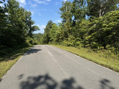 Wooded & peaceful building lot at The Highlands of Eagles Nest on Eagles Nest Country Club in Kentucky - for sale on GolfHomes.com, golf home, golf lot