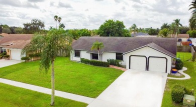 Say HELLO TO YOUR NEW HOME! This beautifully renovated 2,140 sq on Village Golf Club in Florida - for sale on GolfHomes.com, golf home, golf lot