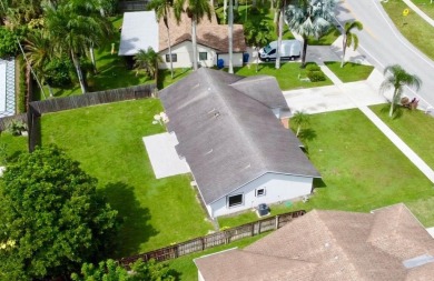 Say HELLO TO YOUR NEW HOME! This beautifully renovated 2,140 sq on Village Golf Club in Florida - for sale on GolfHomes.com, golf home, golf lot