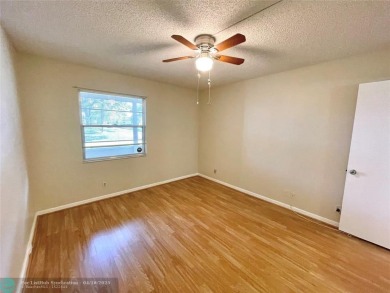 1ST FLOOR CONDO CAN BE RENTED RIGHT AWAY, 2 BEDROOM 1 1/5 on Flamingo Lakes Country Club in Florida - for sale on GolfHomes.com, golf home, golf lot
