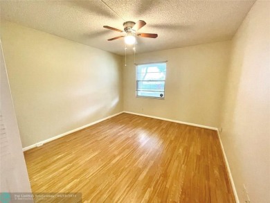 1ST FLOOR CONDO CAN BE RENTED RIGHT AWAY, 2 BEDROOM 1 1/5 on Flamingo Lakes Country Club in Florida - for sale on GolfHomes.com, golf home, golf lot