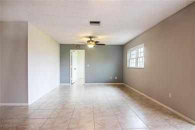 Check out this move-in ready 3BR/2.5BA home with an attached on Cypress Lake Country Club in Florida - for sale on GolfHomes.com, golf home, golf lot