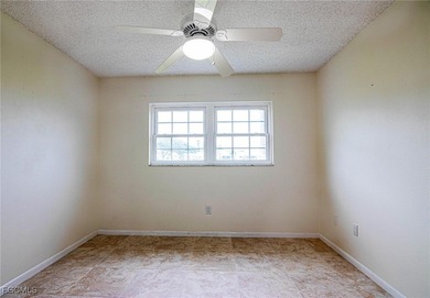 Check out this move-in ready 3BR/2.5BA home with an attached on Cypress Lake Country Club in Florida - for sale on GolfHomes.com, golf home, golf lot