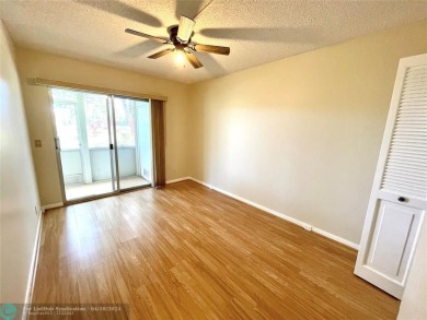 1ST FLOOR CONDO CAN BE RENTED RIGHT AWAY, 2 BEDROOM 1 1/5 on Flamingo Lakes Country Club in Florida - for sale on GolfHomes.com, golf home, golf lot
