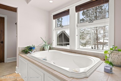 A River Valley Ranch home thoughtfully designed for the rhythm on River Valley Ranch Golf Club in Colorado - for sale on GolfHomes.com, golf home, golf lot