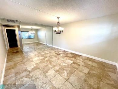 1ST FLOOR CONDO CAN BE RENTED RIGHT AWAY, 2 BEDROOM 1 1/5 on Flamingo Lakes Country Club in Florida - for sale on GolfHomes.com, golf home, golf lot
