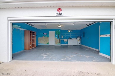 Check out this move-in ready 3BR/2.5BA home with an attached on Cypress Lake Country Club in Florida - for sale on GolfHomes.com, golf home, golf lot