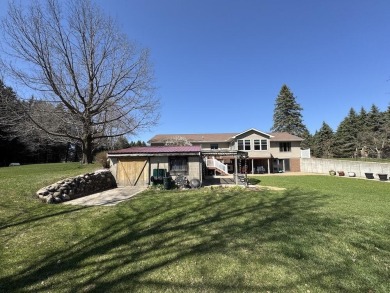 Welcome to 3787 Buzzell Rd. This beautifully updated 4-bedroom on Gladwin Heights Golf Course in Michigan - for sale on GolfHomes.com, golf home, golf lot