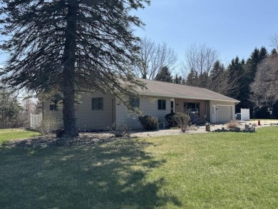 Welcome to 3787 Buzzell Rd. This beautifully updated 4-bedroom on Gladwin Heights Golf Course in Michigan - for sale on GolfHomes.com, golf home, golf lot