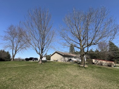 Welcome to 3787 Buzzell Rd. This beautifully updated 4-bedroom on Gladwin Heights Golf Course in Michigan - for sale on GolfHomes.com, golf home, golf lot