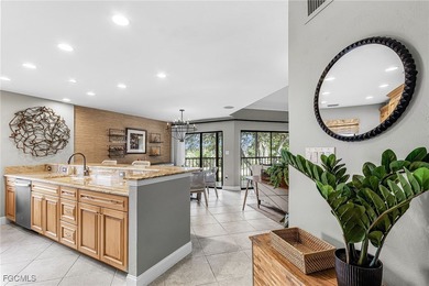 Discover luxury living in this fully furnished, turnkey on Fiddlesticks Country Club in Florida - for sale on GolfHomes.com, golf home, golf lot