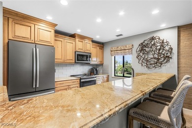 Discover luxury living in this fully furnished, turnkey on Fiddlesticks Country Club in Florida - for sale on GolfHomes.com, golf home, golf lot