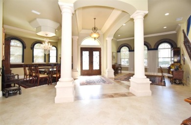 Nestled in the exclusive 24-hour guard-gated community of on Arnold Palmers Bay Hill Club and Lodge  in Florida - for sale on GolfHomes.com, golf home, golf lot