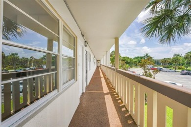 Welcome to this beautifully renovated 2-bedroom 2-bathroom condo on Wynmoor Golf Course in Florida - for sale on GolfHomes.com, golf home, golf lot