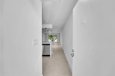 Welcome to this beautifully renovated 2-bedroom 2-bathroom condo on Wynmoor Golf Course in Florida - for sale on GolfHomes.com, golf home, golf lot