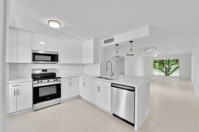 Welcome to this beautifully renovated 2-bedroom 2-bathroom condo on Wynmoor Golf Course in Florida - for sale on GolfHomes.com, golf home, golf lot
