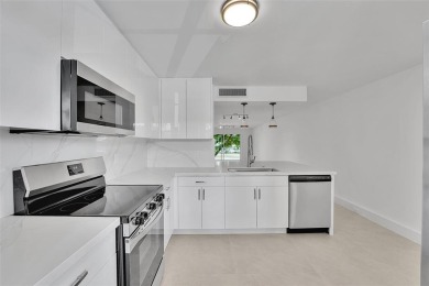 Welcome to this beautifully renovated 2-bedroom 2-bathroom condo on Wynmoor Golf Course in Florida - for sale on GolfHomes.com, golf home, golf lot