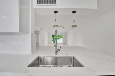 Welcome to this beautifully renovated 2-bedroom 2-bathroom condo on Wynmoor Golf Course in Florida - for sale on GolfHomes.com, golf home, golf lot