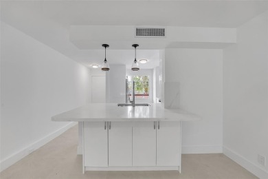 Welcome to this beautifully renovated 2-bedroom 2-bathroom condo on Wynmoor Golf Course in Florida - for sale on GolfHomes.com, golf home, golf lot