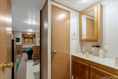 Back on the market, this charming 3 bedroom 1 bath 1999 camper on River Ridge Golf Club in Virginia - for sale on GolfHomes.com, golf home, golf lot
