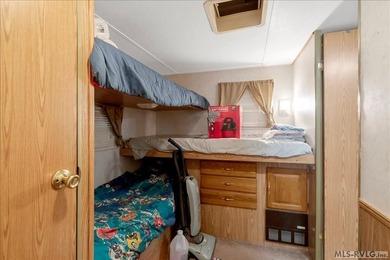 Back on the market, this charming 3 bedroom 1 bath 1999 camper on River Ridge Golf Club in Virginia - for sale on GolfHomes.com, golf home, golf lot