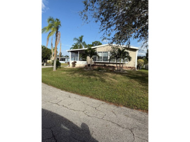 This great manufactured home on leased land is located in Lake on Pine Lakes Country Club in Florida - for sale on GolfHomes.com, golf home, golf lot