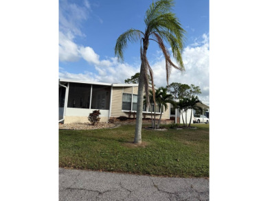 This great manufactured home on leased land is located in Lake on Pine Lakes Country Club in Florida - for sale on GolfHomes.com, golf home, golf lot