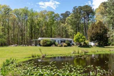 14.4 acres hidden off the beaten path.  5 Minutes to downtown on The Pines At Elizabeth City in North Carolina - for sale on GolfHomes.com, golf home, golf lot
