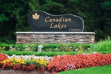 Welcome to one of the most sought-after locations in Canadian on Canadian Lakes Country Club-The Royal Course in Michigan - for sale on GolfHomes.com, golf home, golf lot