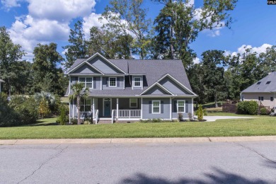 Welcome to 127 Lake Summit Drive, a meticulously built 4-bedroom on Timberlake Country Club in South Carolina - for sale on GolfHomes.com, golf home, golf lot