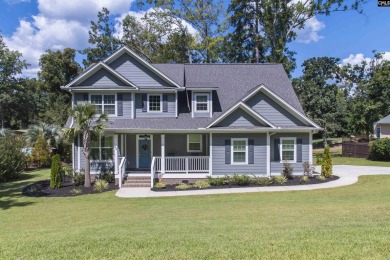 Welcome to 127 Lake Summit Drive, a meticulously built 4-bedroom on Timberlake Country Club in South Carolina - for sale on GolfHomes.com, golf home, golf lot