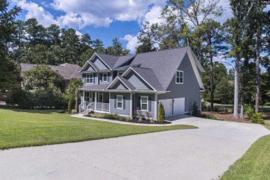 Welcome to 127 Lake Summit Drive, a meticulously built 4-bedroom on Timberlake Country Club in South Carolina - for sale on GolfHomes.com, golf home, golf lot