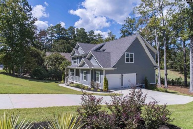 Welcome to 127 Lake Summit Drive, a meticulously built 4-bedroom on Timberlake Country Club in South Carolina - for sale on GolfHomes.com, golf home, golf lot