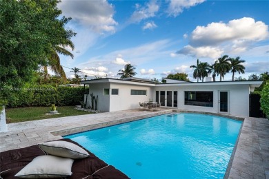 This beautifully remodeled 3-bed, 2-bath home in the Normandy on Normandy Shores Golf Course in Florida - for sale on GolfHomes.com, golf home, golf lot