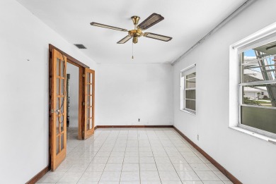 Welcome to this charming 2-bed, 2-bath single-family home on a on Leisureville Community Golf Course in Florida - for sale on GolfHomes.com, golf home, golf lot