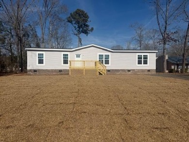Live the lake life just steps away from Lake Marion! This BRAND on Players Course At Wyboo Plantation in South Carolina - for sale on GolfHomes.com, golf home, golf lot