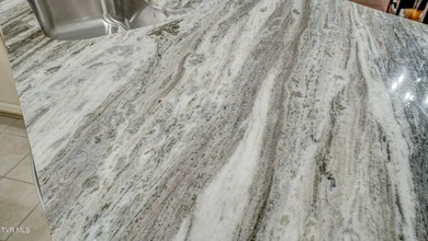 Welcome to easy living in the prestigious Cottages at Feathers on Tri Cities Golf Club in Tennessee - for sale on GolfHomes.com, golf home, golf lot