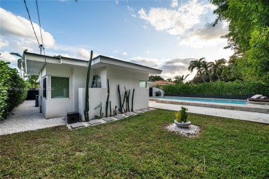 This beautifully remodeled 3-bed, 2-bath home in the Normandy on Normandy Shores Golf Course in Florida - for sale on GolfHomes.com, golf home, golf lot