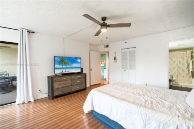 Step into this spacious and beautifully maintained 2-br, 2-ba on Palm-Aire Country Club and Resort - Palms in Florida - for sale on GolfHomes.com, golf home, golf lot