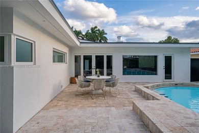 This beautifully remodeled 3-bed, 2-bath home in the Normandy on Normandy Shores Golf Course in Florida - for sale on GolfHomes.com, golf home, golf lot