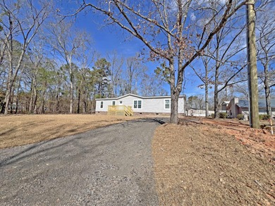 Live the lake life just steps away from Lake Marion! This BRAND on Players Course At Wyboo Plantation in South Carolina - for sale on GolfHomes.com, golf home, golf lot