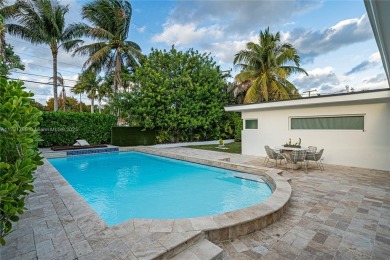 This beautifully remodeled 3-bed, 2-bath home in the Normandy on Normandy Shores Golf Course in Florida - for sale on GolfHomes.com, golf home, golf lot