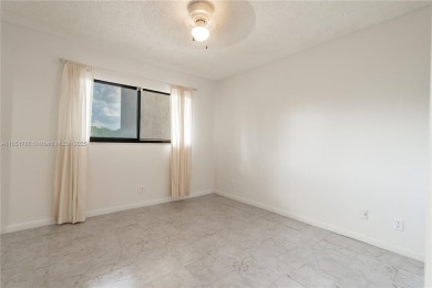 Step into this spacious and beautifully maintained 2-br, 2-ba on Palm-Aire Country Club and Resort - Palms in Florida - for sale on GolfHomes.com, golf home, golf lot