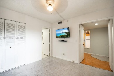 Step into this spacious and beautifully maintained 2-br, 2-ba on Palm-Aire Country Club and Resort - Palms in Florida - for sale on GolfHomes.com, golf home, golf lot