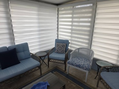 Move in ready! Complete with high end furnishings! Zebra blinds on Grasslands Golf and Country Club in Florida - for sale on GolfHomes.com, golf home, golf lot