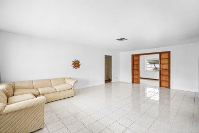 Welcome to this charming 2-bed, 2-bath single-family home on a on Leisureville Community Golf Course in Florida - for sale on GolfHomes.com, golf home, golf lot