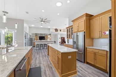 Experience elevated Florida living in this beautifully designed on Southern Woods Golf Club in Florida - for sale on GolfHomes.com, golf home, golf lot